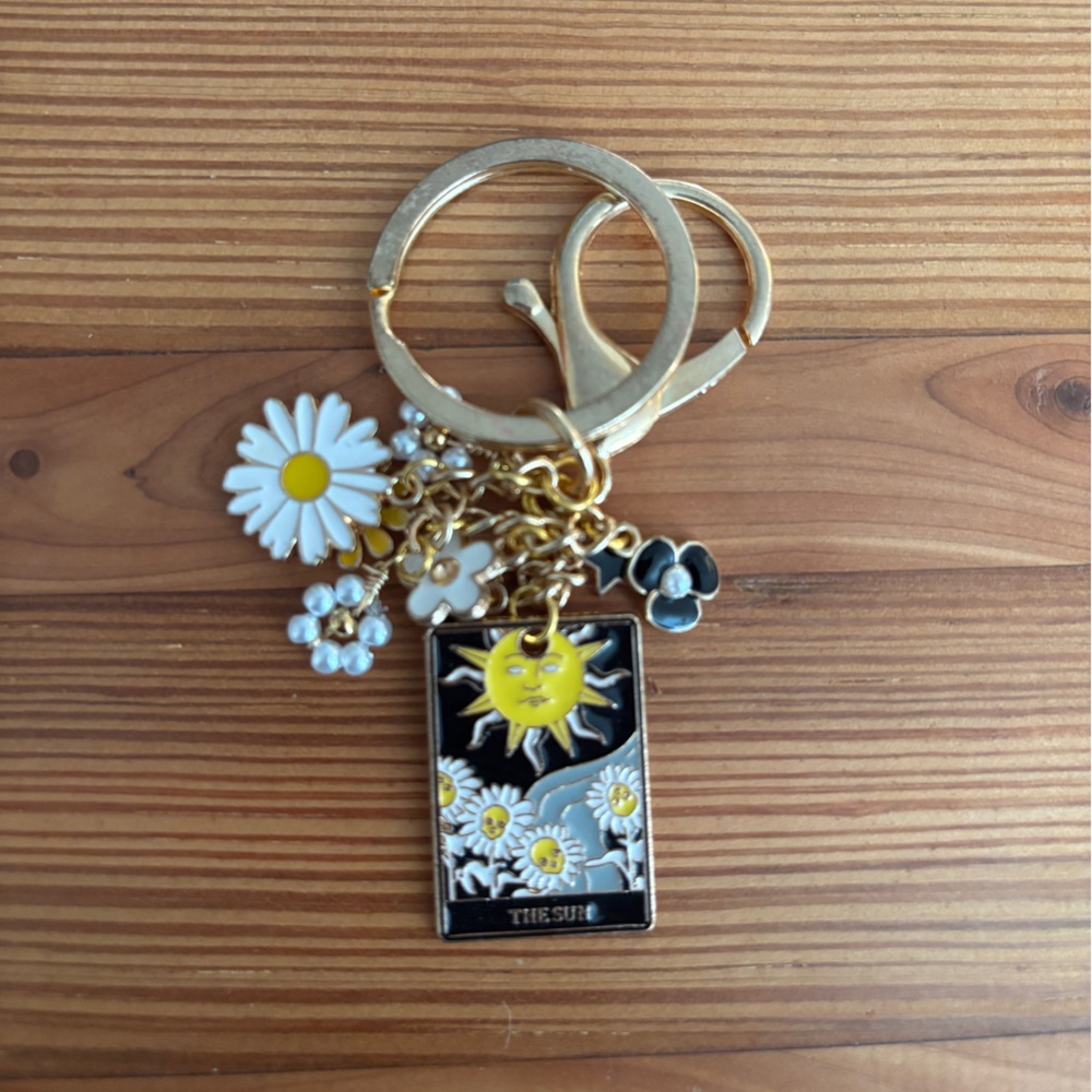 Gold and White Keychain Bag Charm with Sun Floral Design